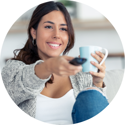 girl with coffee and remote